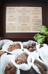 Image of boxed sampler of candy shaped like wild animal scat