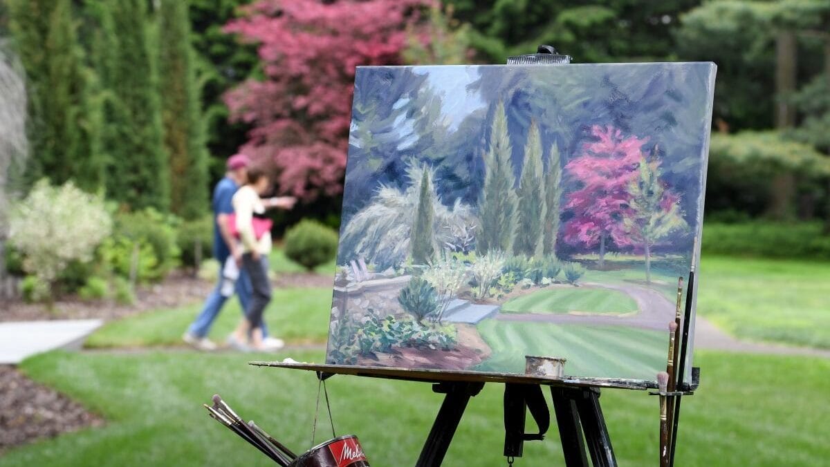 a plein air painting of a garden with the garden and people walking in the background
