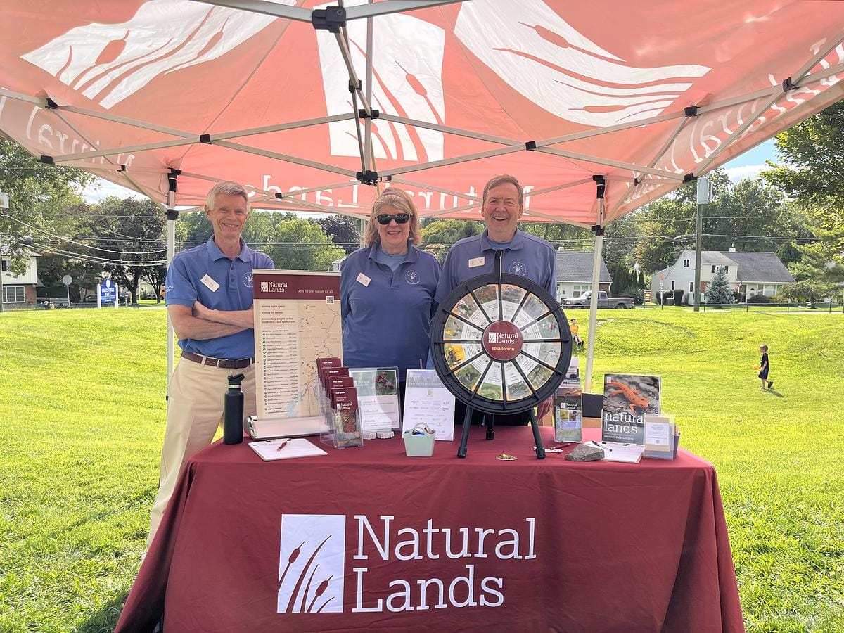 Three volunteers (from left to right: Tim Lander, Lin Hall, Ralph Hall) representing Natural Lands at the Willistown Country Fair, August 20, 2024.