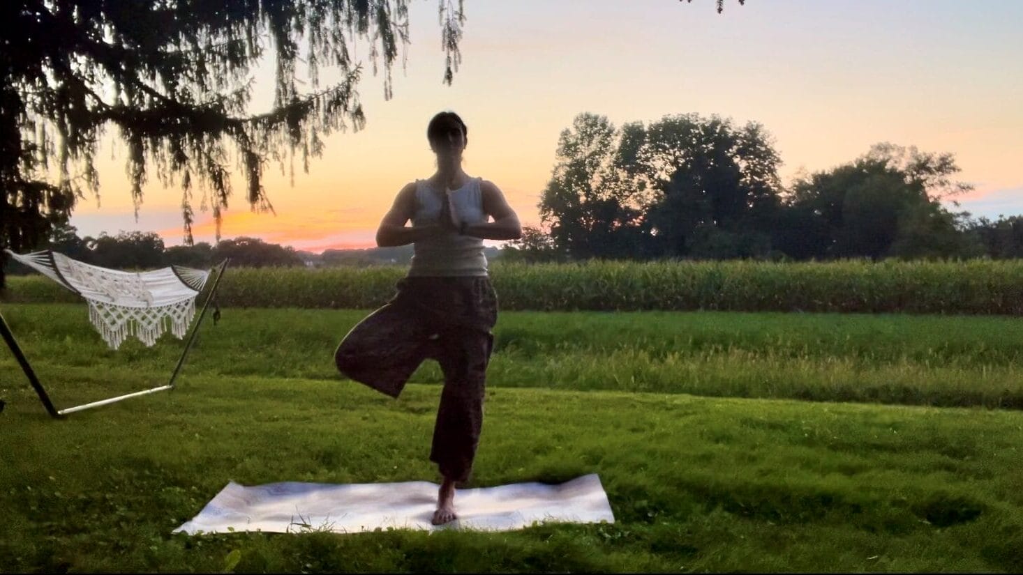 person doing yoga in nature