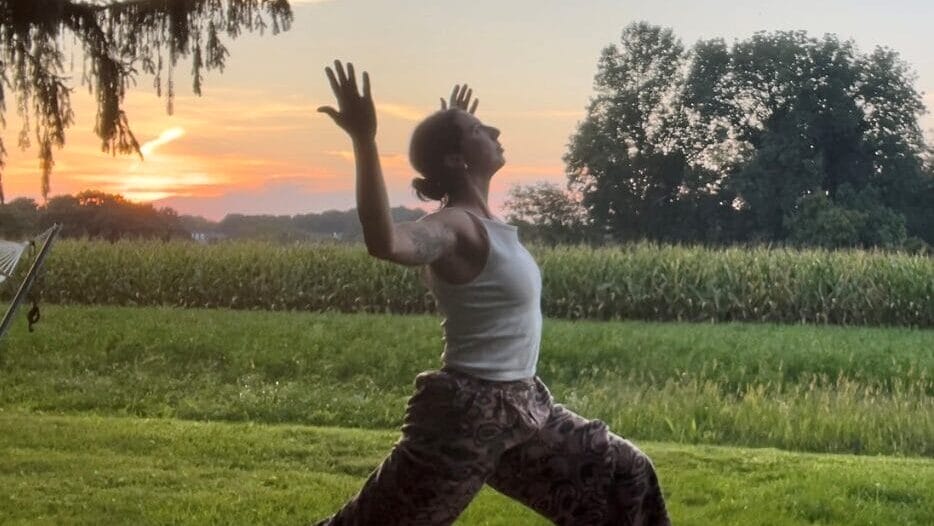 person doing yoga in nature