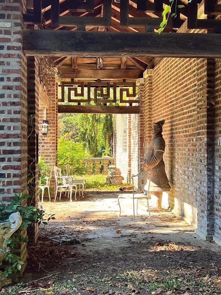 a statue inside a red brick structure