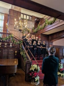 Highschool choir performing at Home for the Holidays