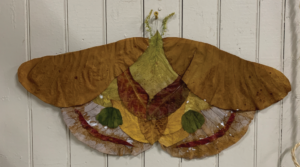 A moth wall art made from glycerinized leaves